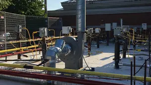 In-Situ Thermal Remediation setup featuring a network of pipes and equipment for soil decontamination at an industrial site.