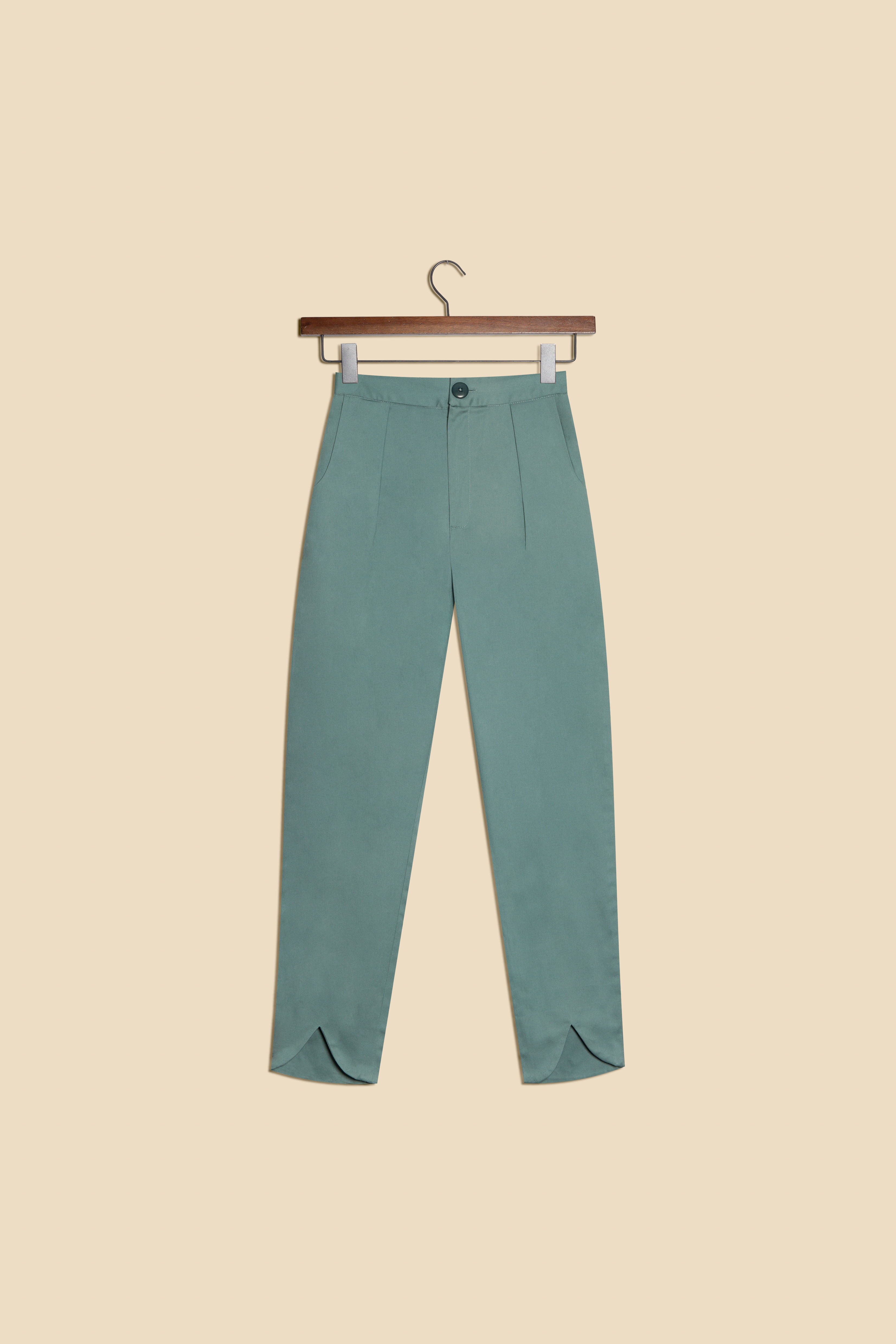 vintage green high-wasted trousers with split leg detail, front and back pockets and zipper fly and elasticated back waist