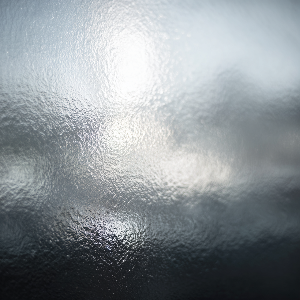 LazyKitten88_Abstract_bokeh_light_leak_on_a_metallic_surface__eccbb590-e6c9-468f-856a-b174