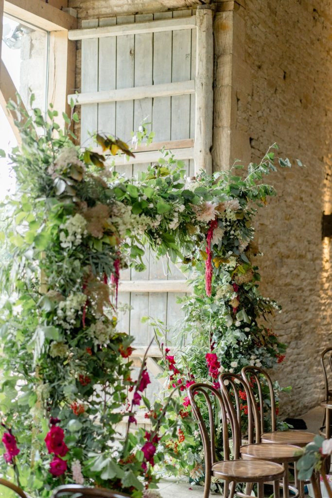 Autumn floral arch for wedding ceremony