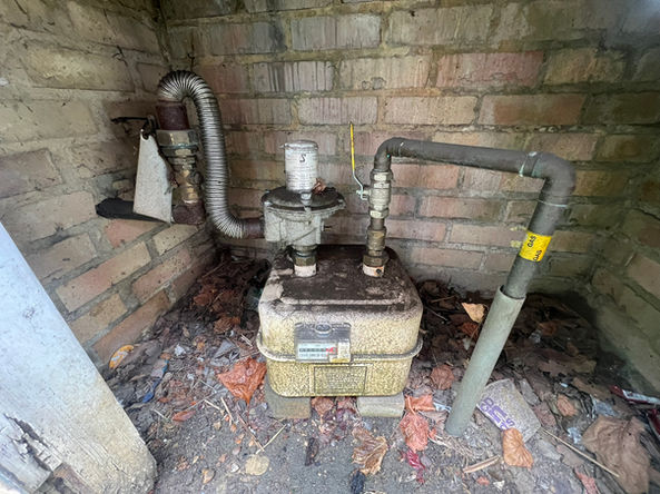 Main earthing and bonding inspected during a commercial EICR.