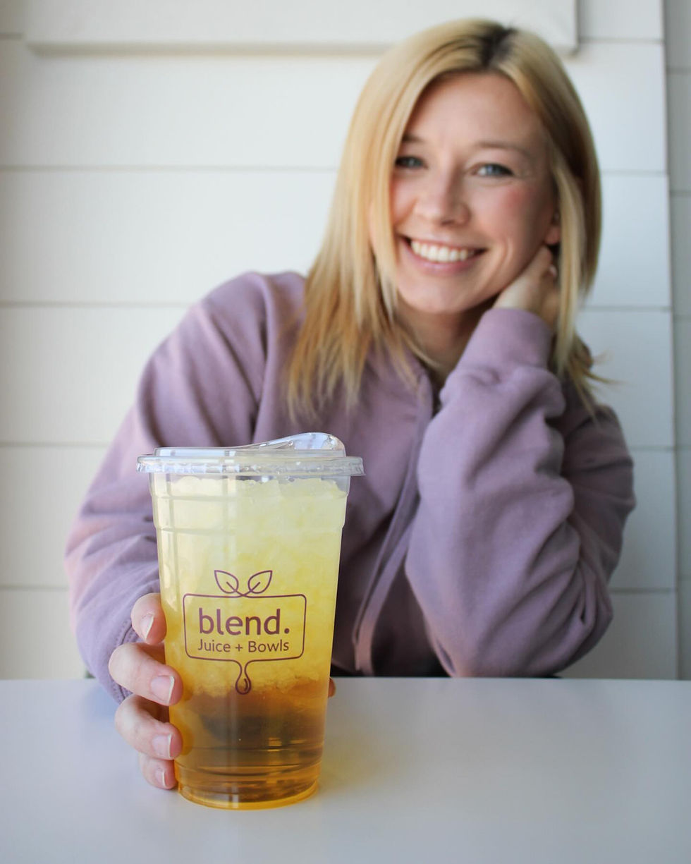 girl holding a energy drink