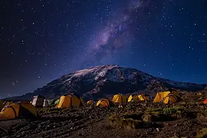 beautiful-scenery-yellow-tents-kilimanjaro-national-park-scaled.jpg.webp