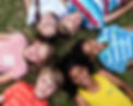 children-lying-on-the-grass.jpg