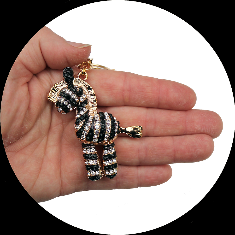 Miniaturbild: Schlüsselanhänger mit strassbesetztem Zebra aus goldfarbenem Metall
