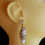Thumbnail: Earrings with sea snails, white pearls and zirconia-set mountings