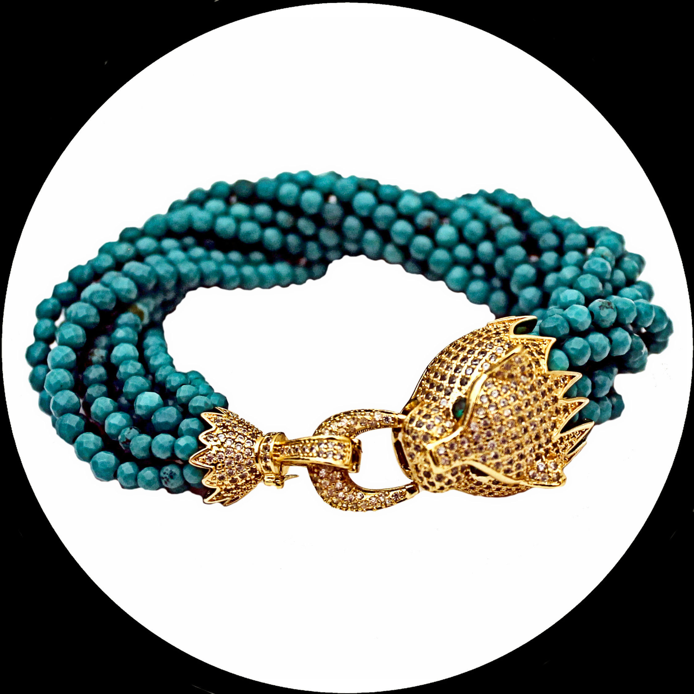 Bracciale dorato con chiusura a forma di pantera con pavé di zirconia cubica e perle turchesi