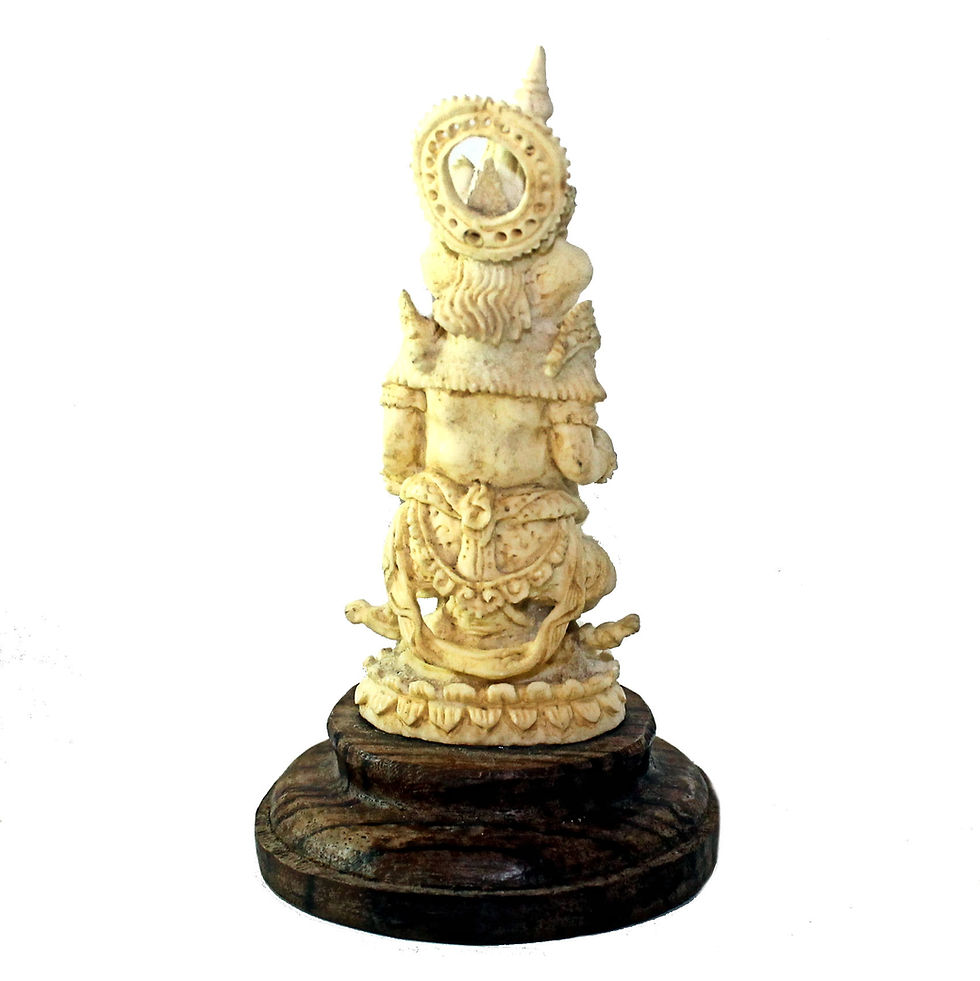Thumbnail: Small Ganesha sculpture made from carved buffalo horn on a wooden base