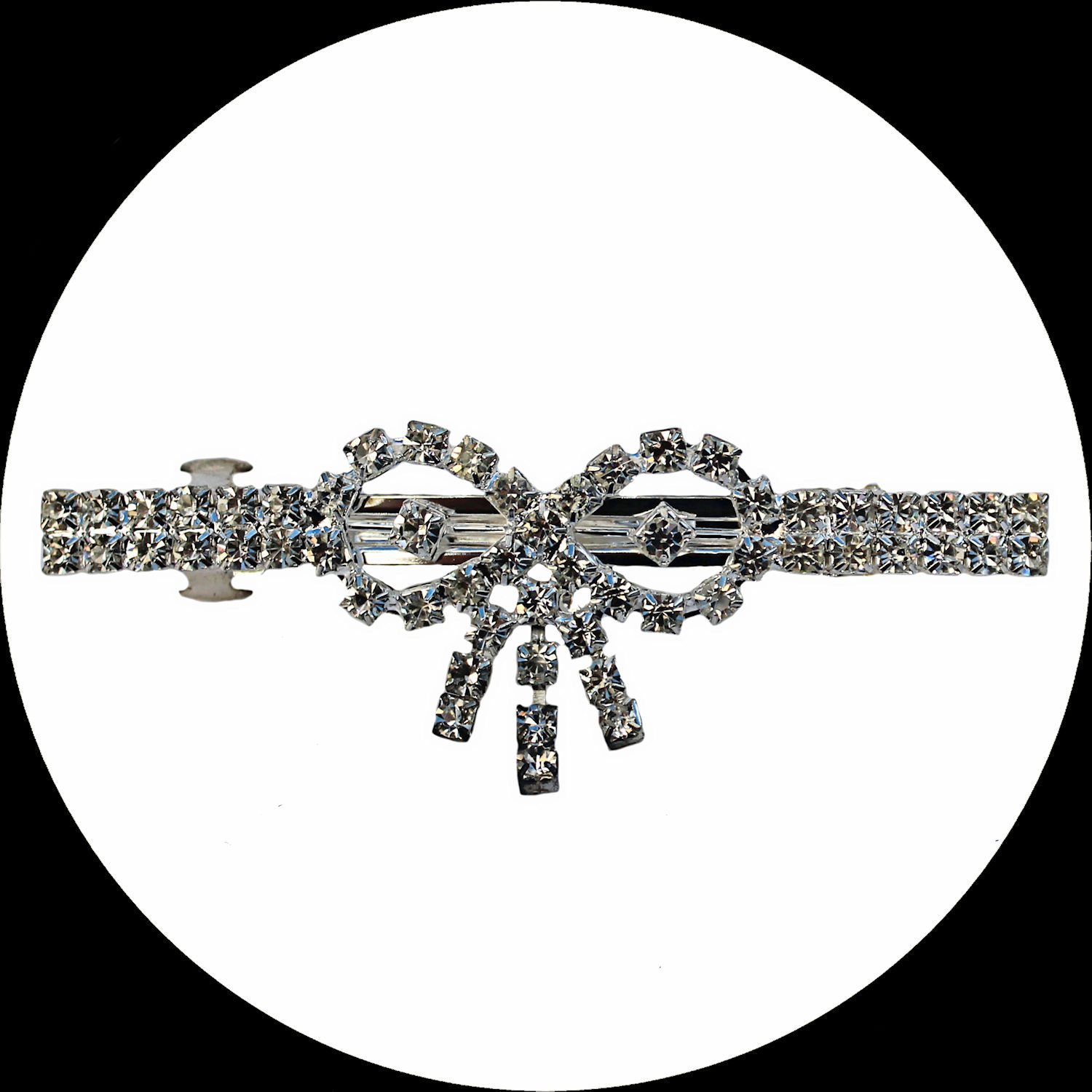 Haarspange mit Schleife und weißen Strasssteinen aus silberfarbenem Metall