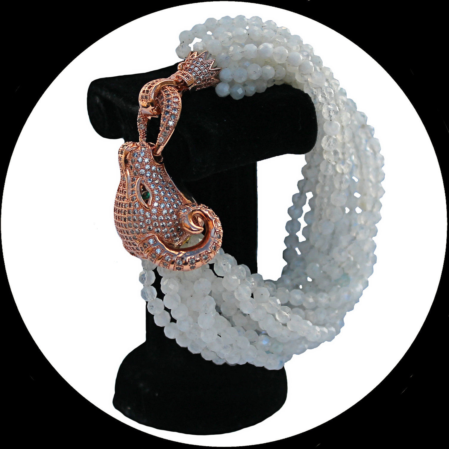 Rosegold plated bracelet with moonstones and a zirconia paved ram shaped clasp