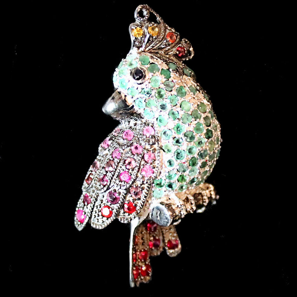 Brooch parrot with emerald and sapphire from ruthenium-plated sterling silver