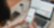 forex-trader-using-crypto-exchange-mobile-phone-ap-2023-11-27-04-54-08-utc.jpg