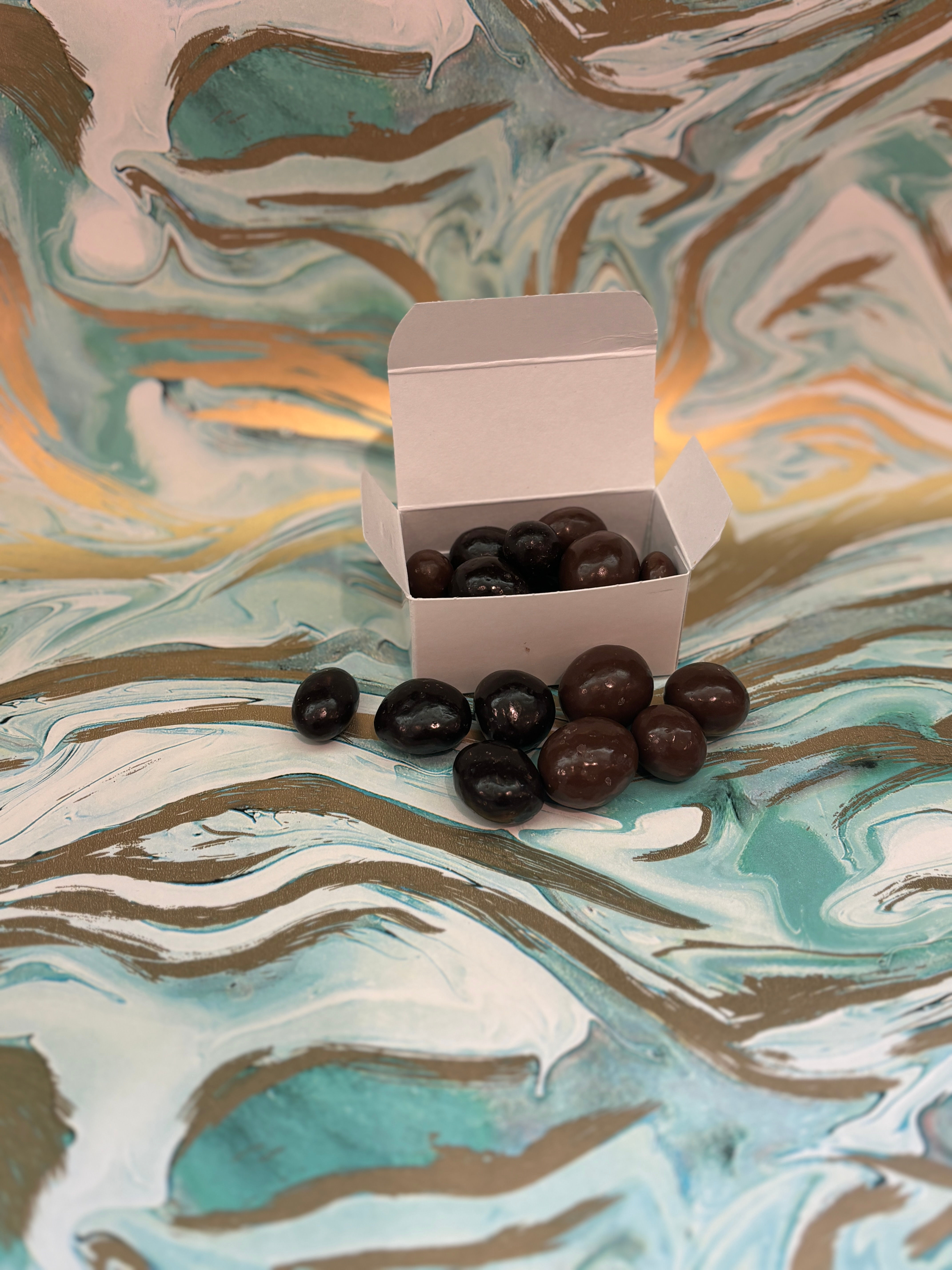 2 oz. Chocolate cranberries in a box