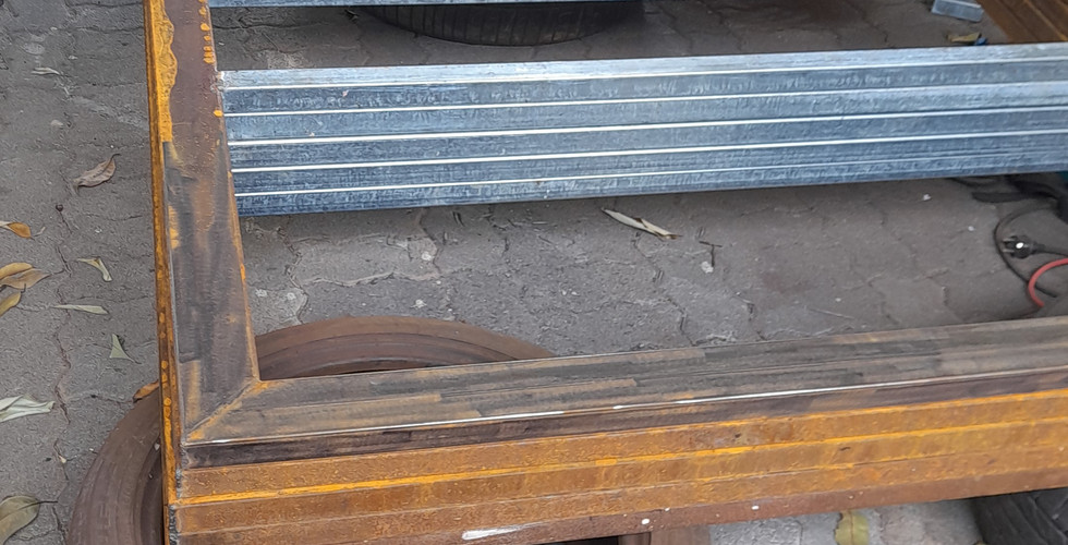 Welding and Sanding of Pipe Rack Part