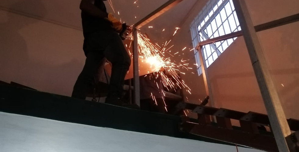 Grinding after welding by Yvan The Handyman