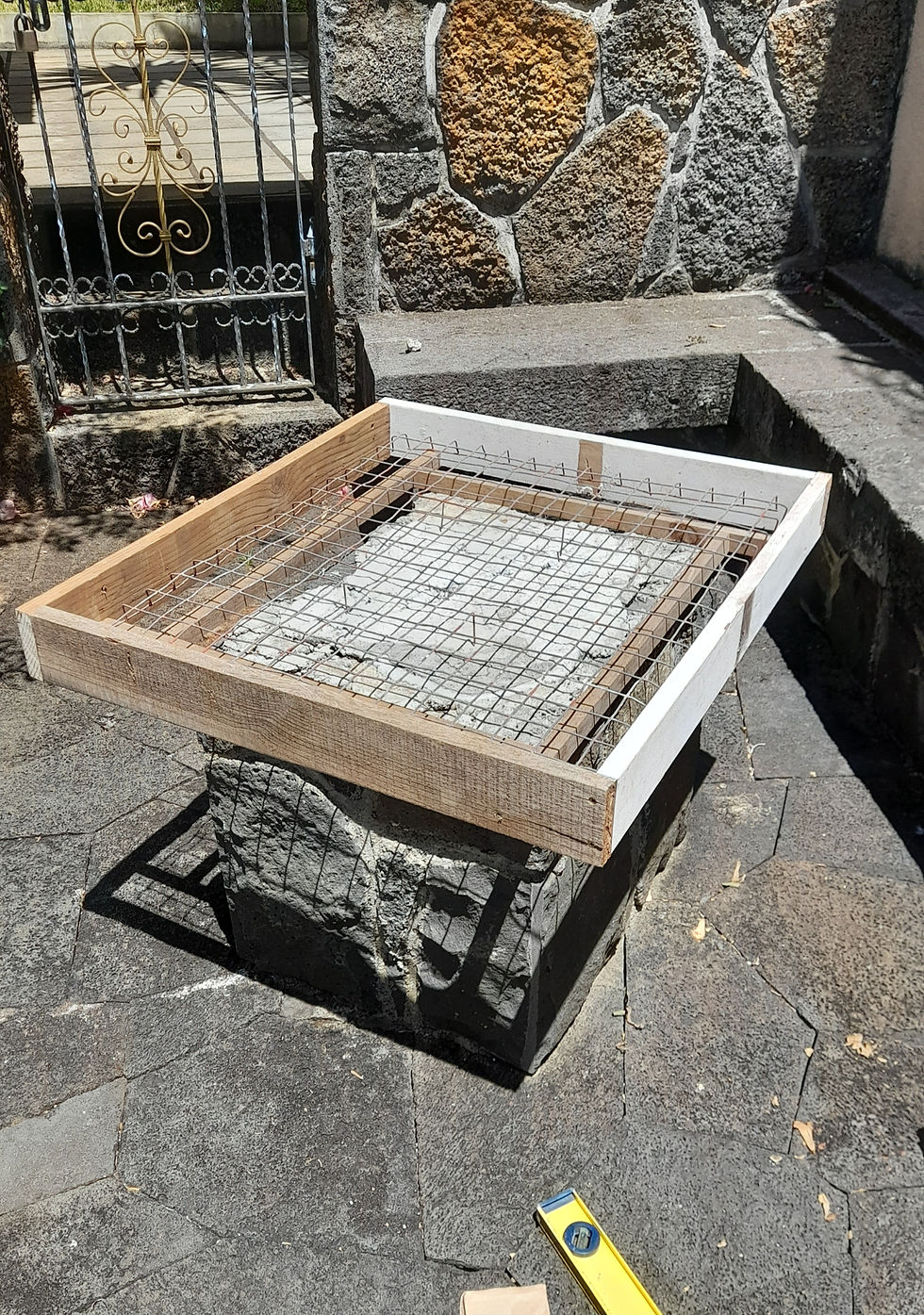Wooden Formwork with Metallic Mesh on Rock Stump