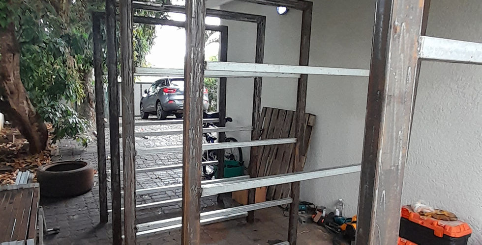 Rack sections hanging for painting