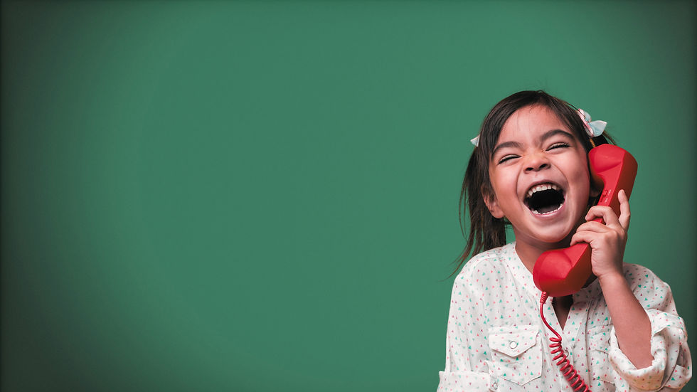 Child calling on telephone