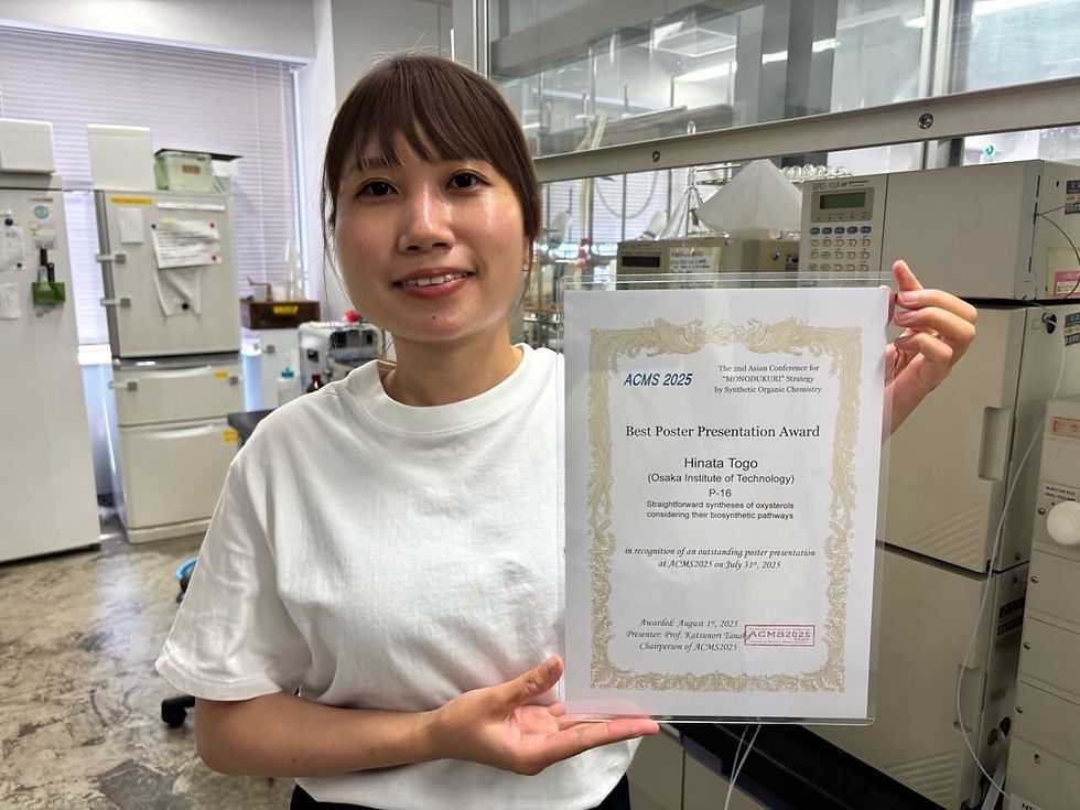 Hinata Togo holding the award certificate