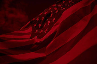 dark-american-flag-overlaid-with-a-red-filter-jo5dngvpw8p05brs.jpg
