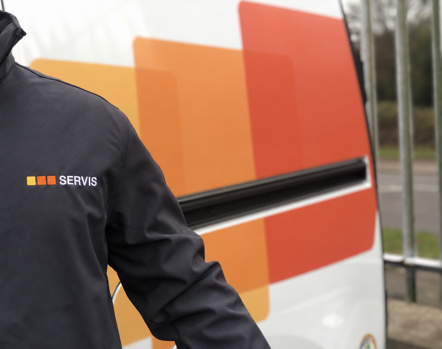 Servis colleague wearing a branded security jacket