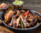 CHICKEN AND STEAK FAJITAS
