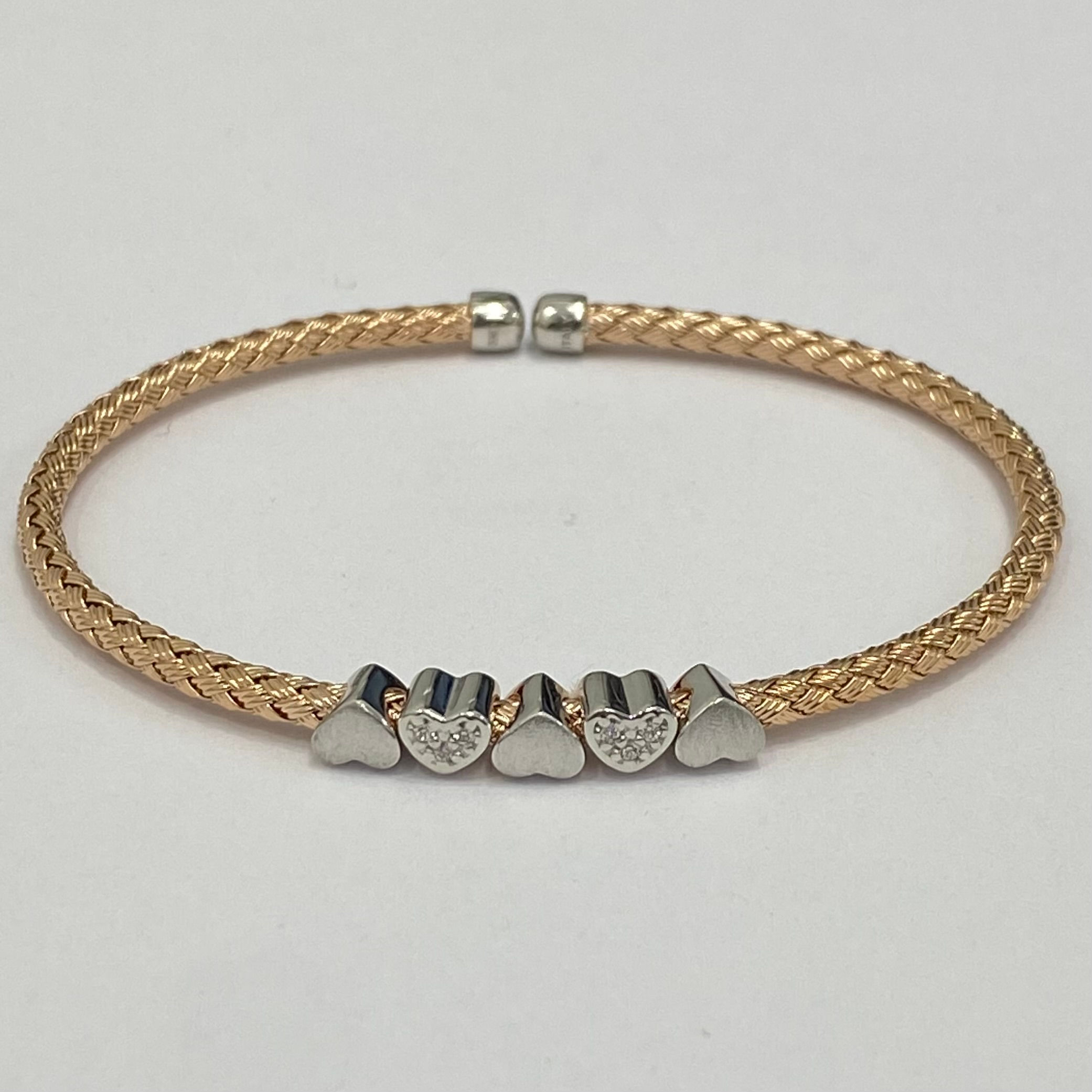 Brazalete Trenzado de plata de primera ley chapado oro rosa con circonitas.