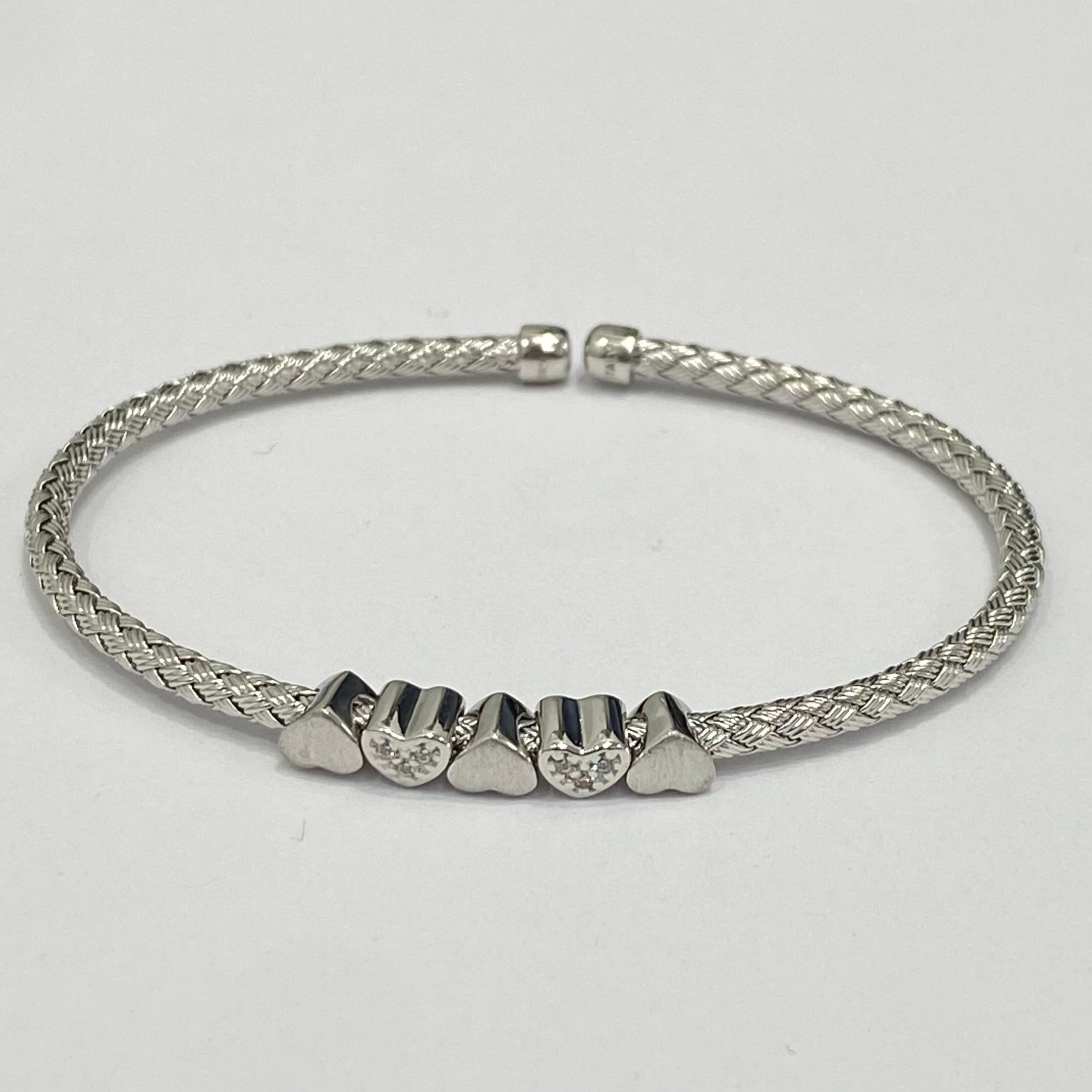 Brazalete Trenzado de plata de primera ley rodiado con circonitas.