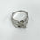 Miniatura: Sortija lisa de plata de primera ley con baño de rodio.