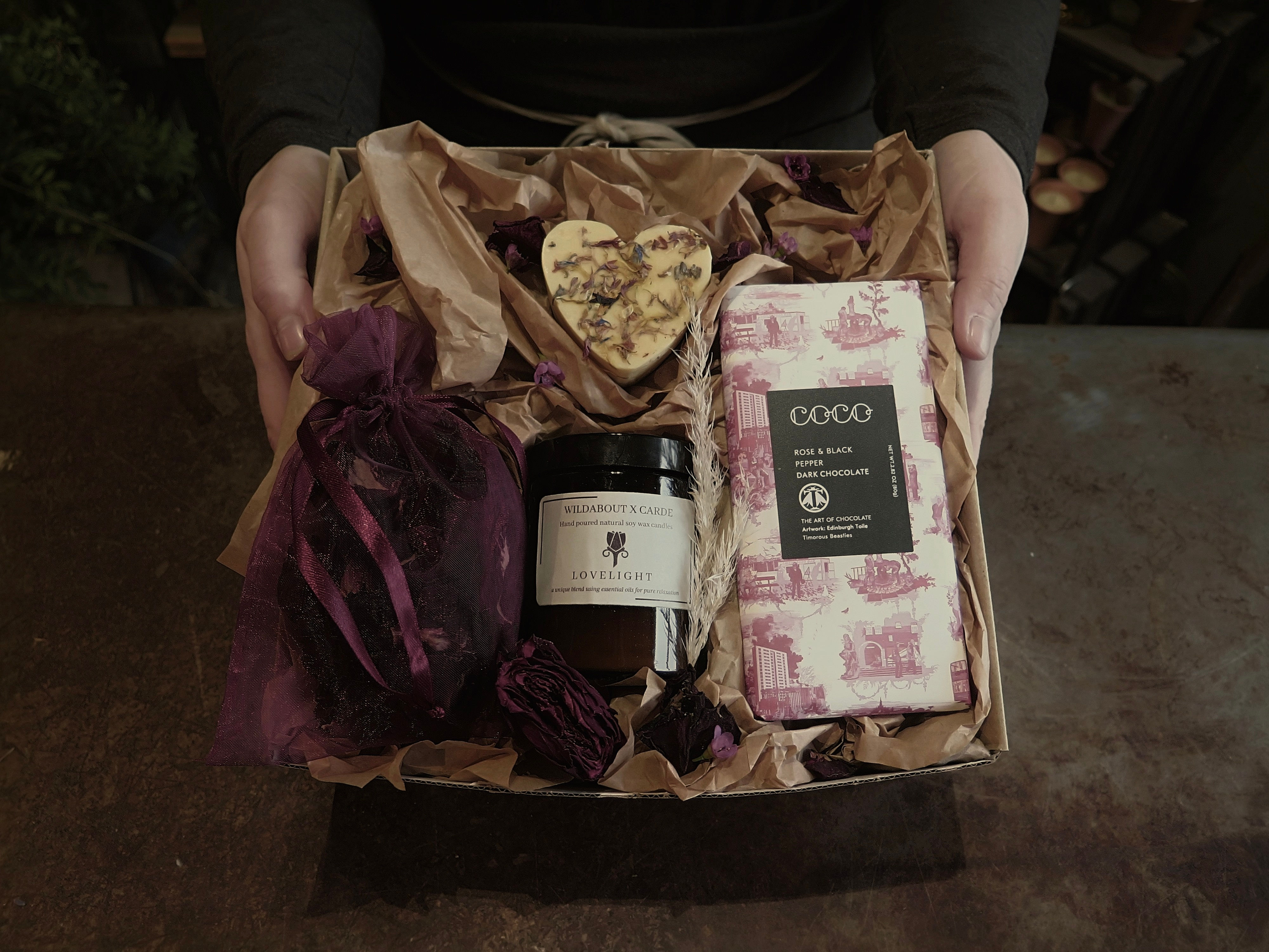 Romance at Home Gift Box featuring dried rose petals, heart-shaped soap and luxury chocolate