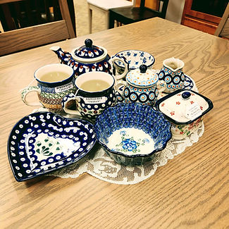 Heart Shaped Platter 7" - Bleeding Heart Peacock | Bubble Mug 11oz - Autumn | Bubble Mug 11oz - Mosquito | Fluted Bowl 4" - Blue Poppy | Teapot 1qt - American Peacock | Cream & Sugar with Saucer - Modern Peacock | Small Box with Lid - Rosy Cheeks | Ice Cream Bowl - Lily of the Nile - Ceramika Artystyczna Bolesławiec Polish Pottery - The Amish Home - Galleria at Pittsburgh Mills Amish Furniture