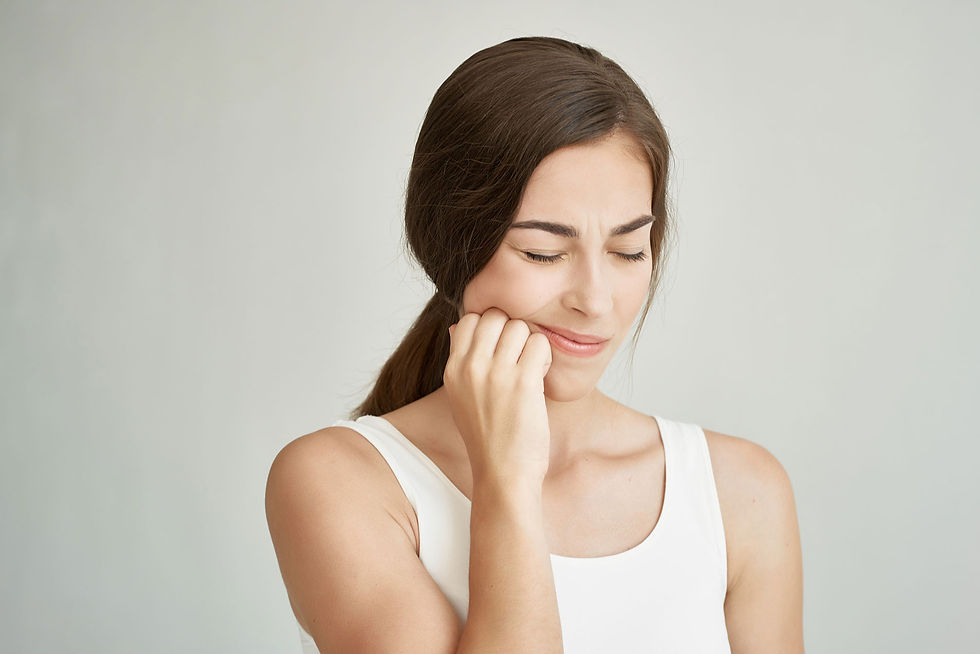 Woman Massaging Masseter Muscle in Jaw