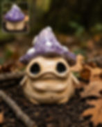 Small ceramic mushroom creature sculpture staged among soil, leaves, and forest-floor textures.