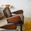 Thumbnail: Teak and Woven Cane Armchairs, A Pair