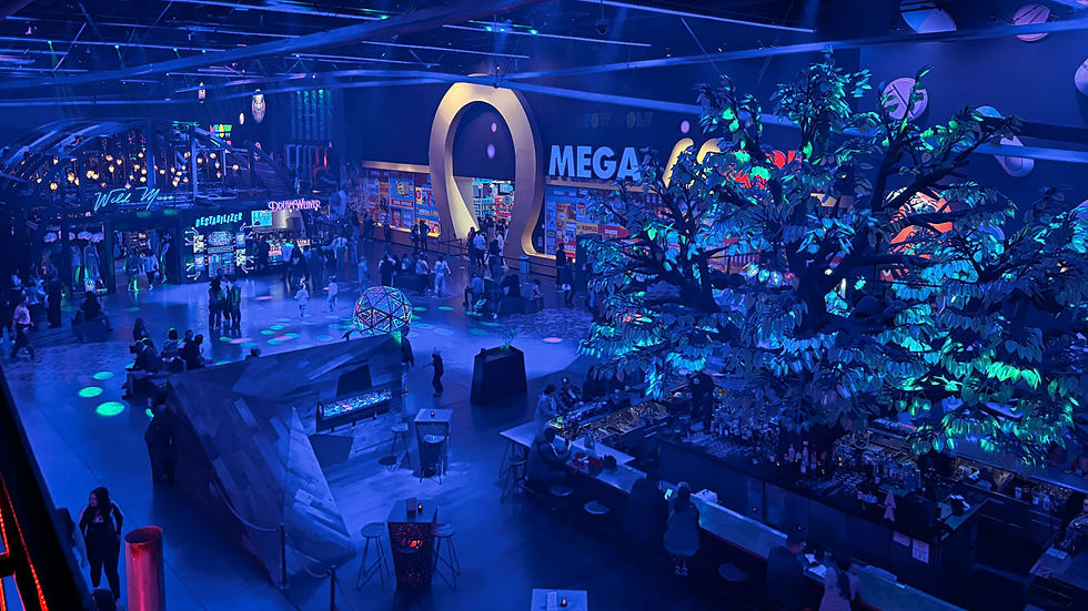 Immersive interior space at AREA15 Las Vegas with large-scale art installation, lighting design, and visitors