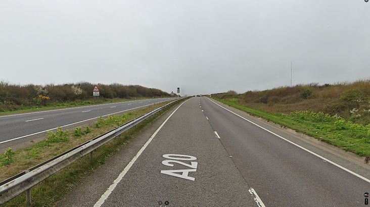 Top Gear Series 10 Episode 2 - Jeremy Clarkson driving his Toyota pickup truck and amphibious vehicle along the motorway near Dover, England.