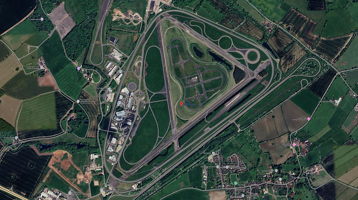 Top Gear Series 10 Episode 7 - Jeremy drifting on a skid pan letting the water sprinklers wash the raw egg off of his head after his turn at the challenge at the MIRA automotive proving grounds with his cheap Leyland car.