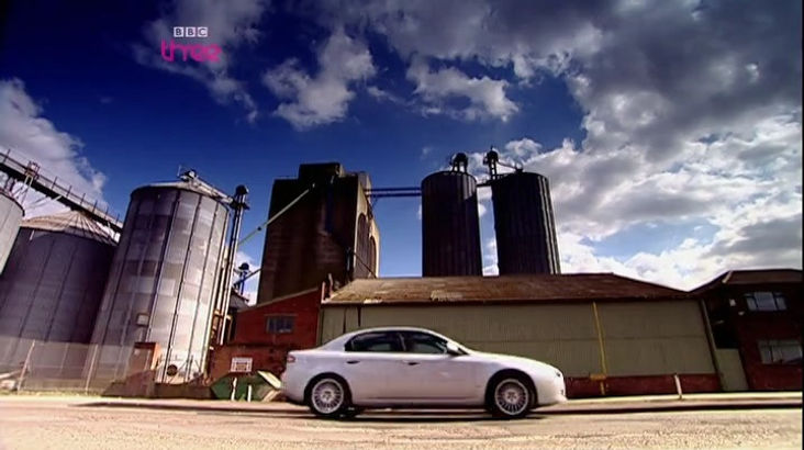 Top Gear Series 10 Episode 6 - James parked in front of an industrial building in the Alfa Romeo 159.