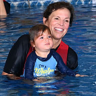 Terry teaching water safety to toddler