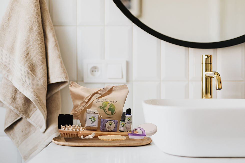 Thumbnail: Holistic Bath Essential Bag with all contents in a bathroom countertop.