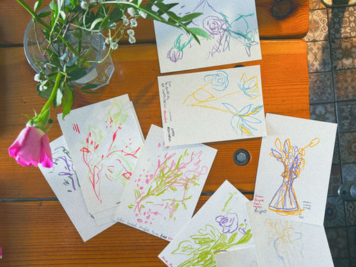 Sketchbook pages with drawing experiments of botanical drawings done in neocolour crayons at a creative social in Liverpool