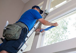 Cleaning windows in King City
