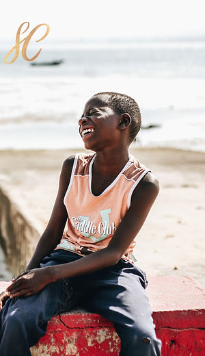 boy on a boat in mozambique