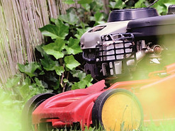 Lawn mower mowing grass