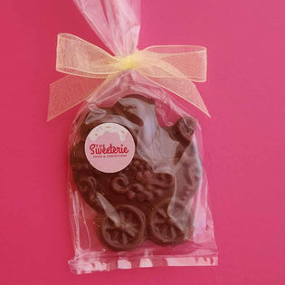 Chocolate baby carriage in bag, 'Stäfänie Chocolates & Sweets' sticker.