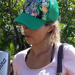 Lifestyle consultant drinking coffee at the beach