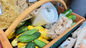 Weise Farms Farmhouse Bundle basket with fresh garden vegetables, slow-rendered Wagyu beef tallow, and homemade noodles from Serbin, Texas.