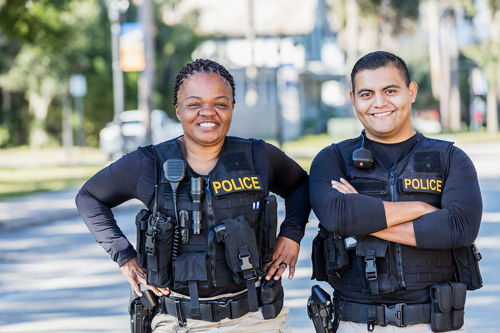 Woman and man in police gear