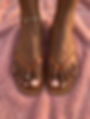 Pedicure results at Fara's Beauty Lounge with sandals.
