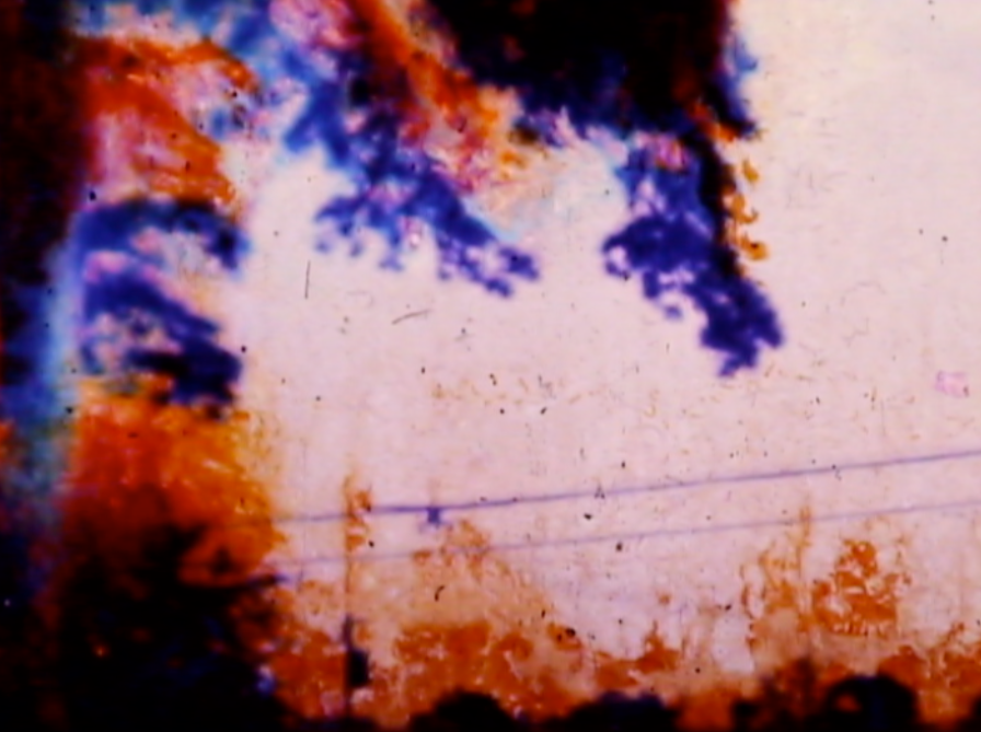 abstract image with purple, orange, and black hues and lines